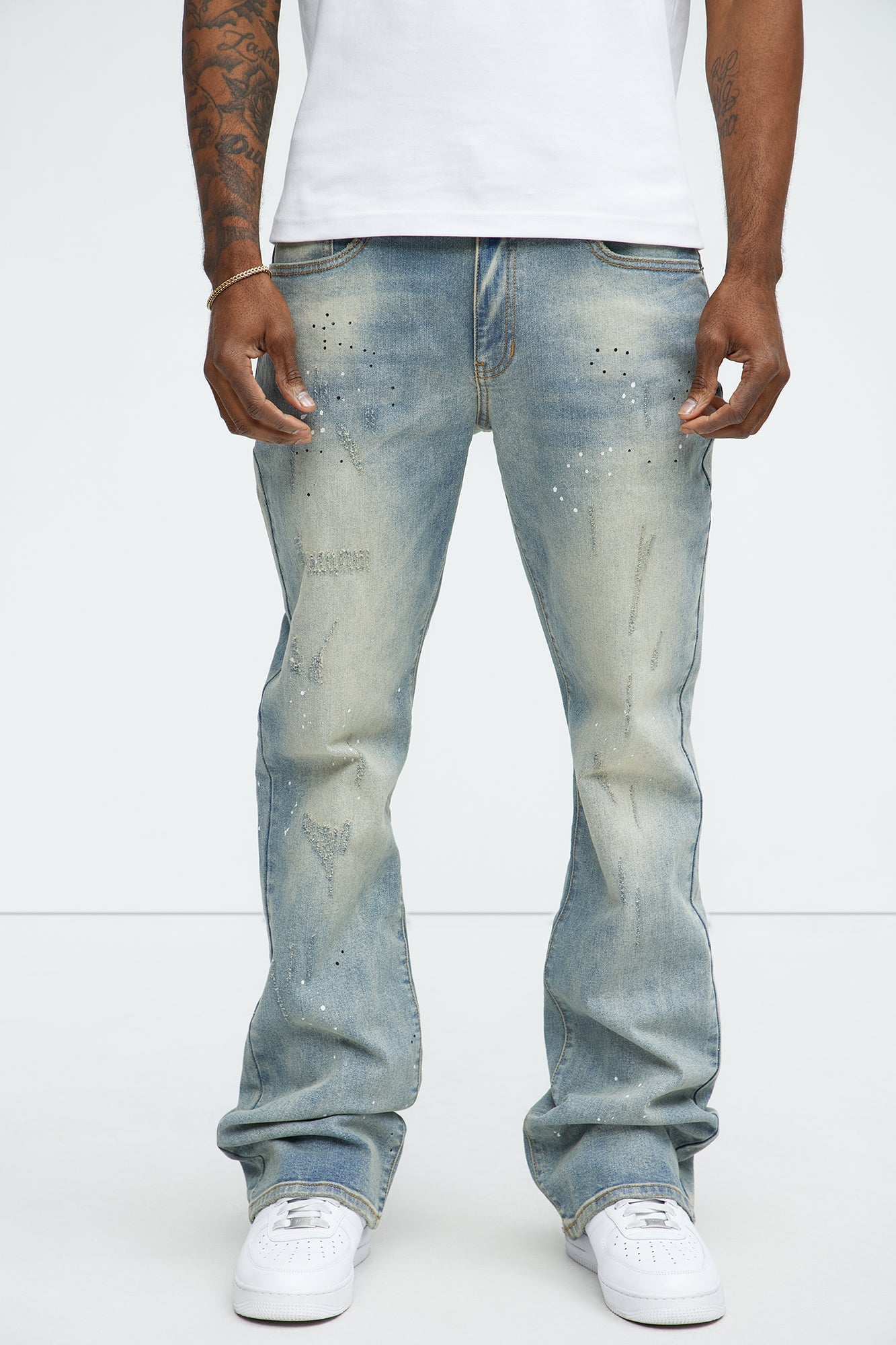 Ripped And Bleach Splatter Stacked Slim Flare Jeans - Light Blue Wash
