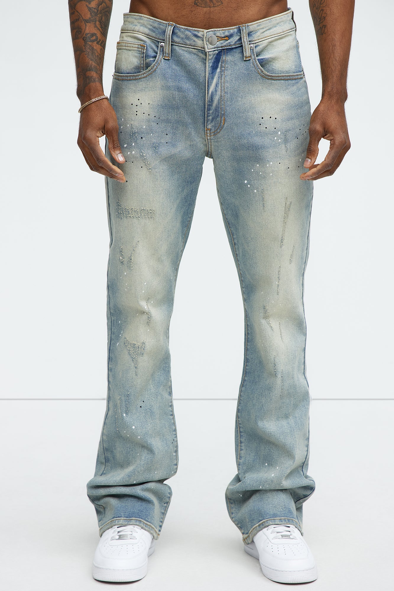 Ripped And Bleach Splatter Stacked Slim Flare Jeans - Light Blue Wash