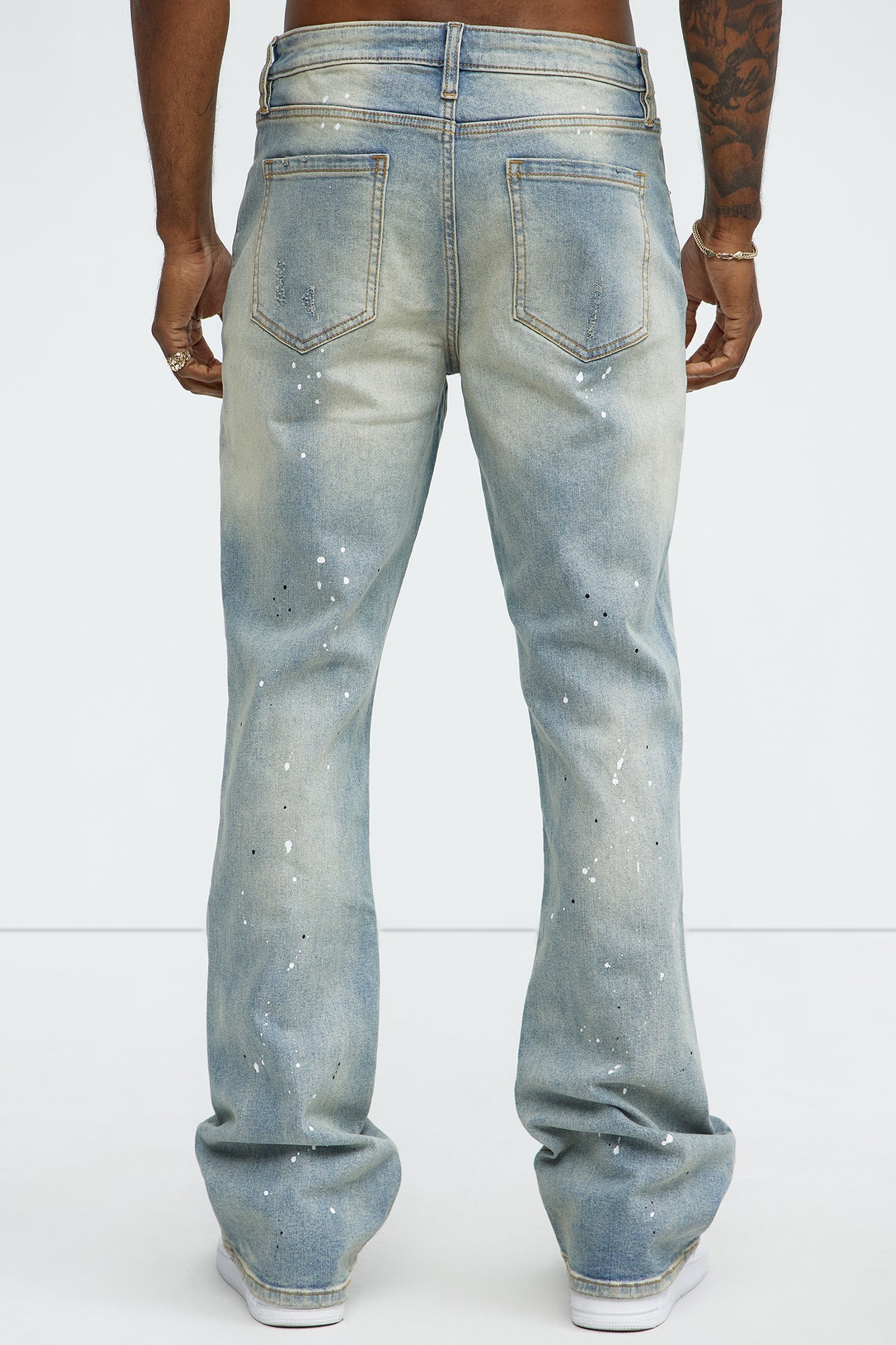 Ripped And Bleach Splatter Stacked Slim Flare Jeans - Light Blue Wash