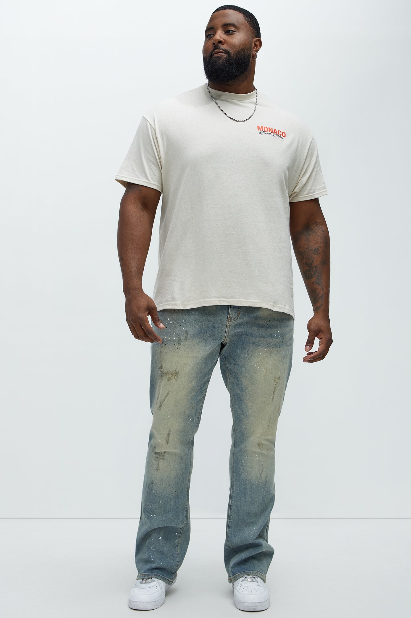 Ripped And Bleach Splatter Stacked Slim Flare Jeans - Light Blue Wash