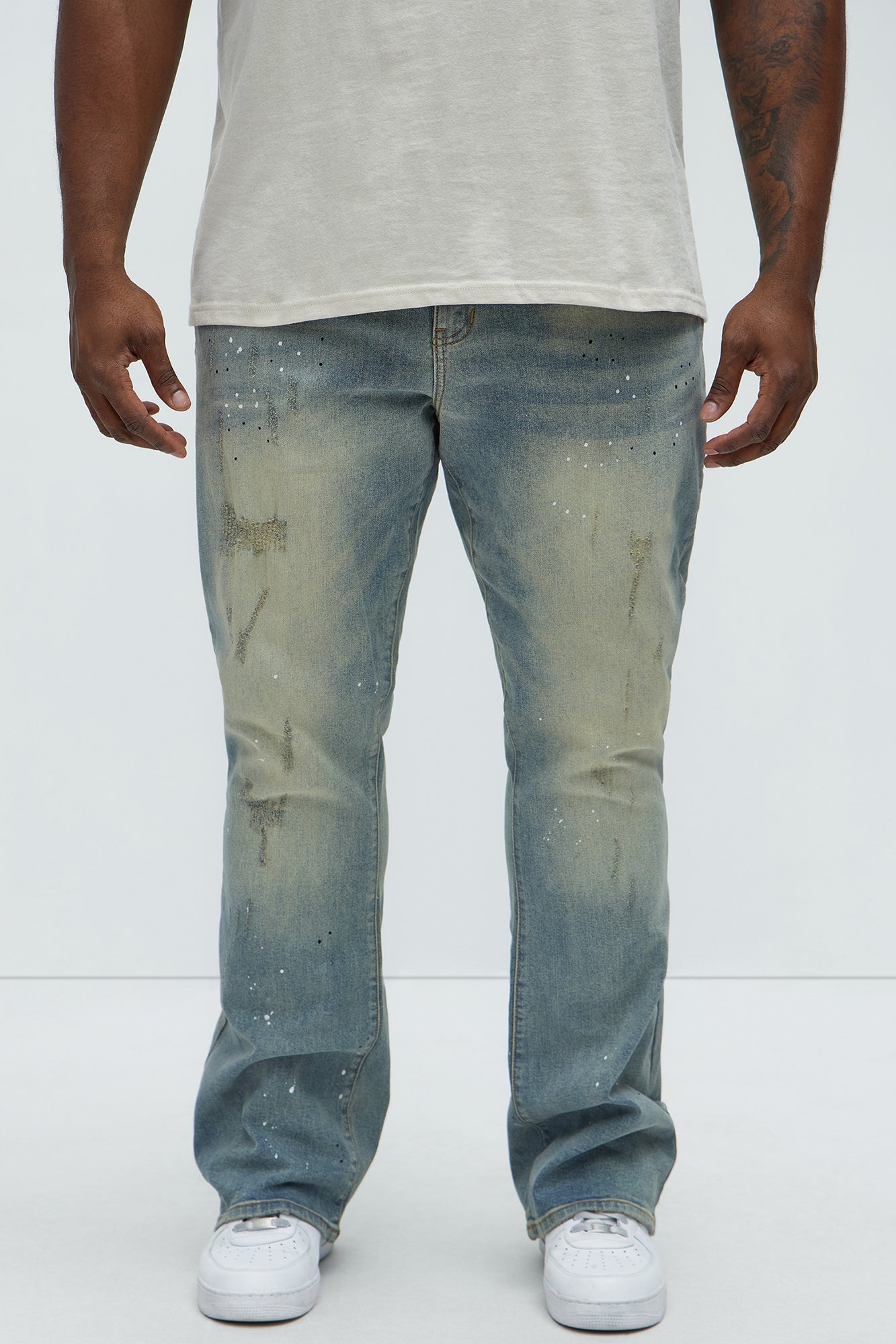 Ripped And Bleach Splatter Stacked Slim Flare Jeans - Light Blue Wash