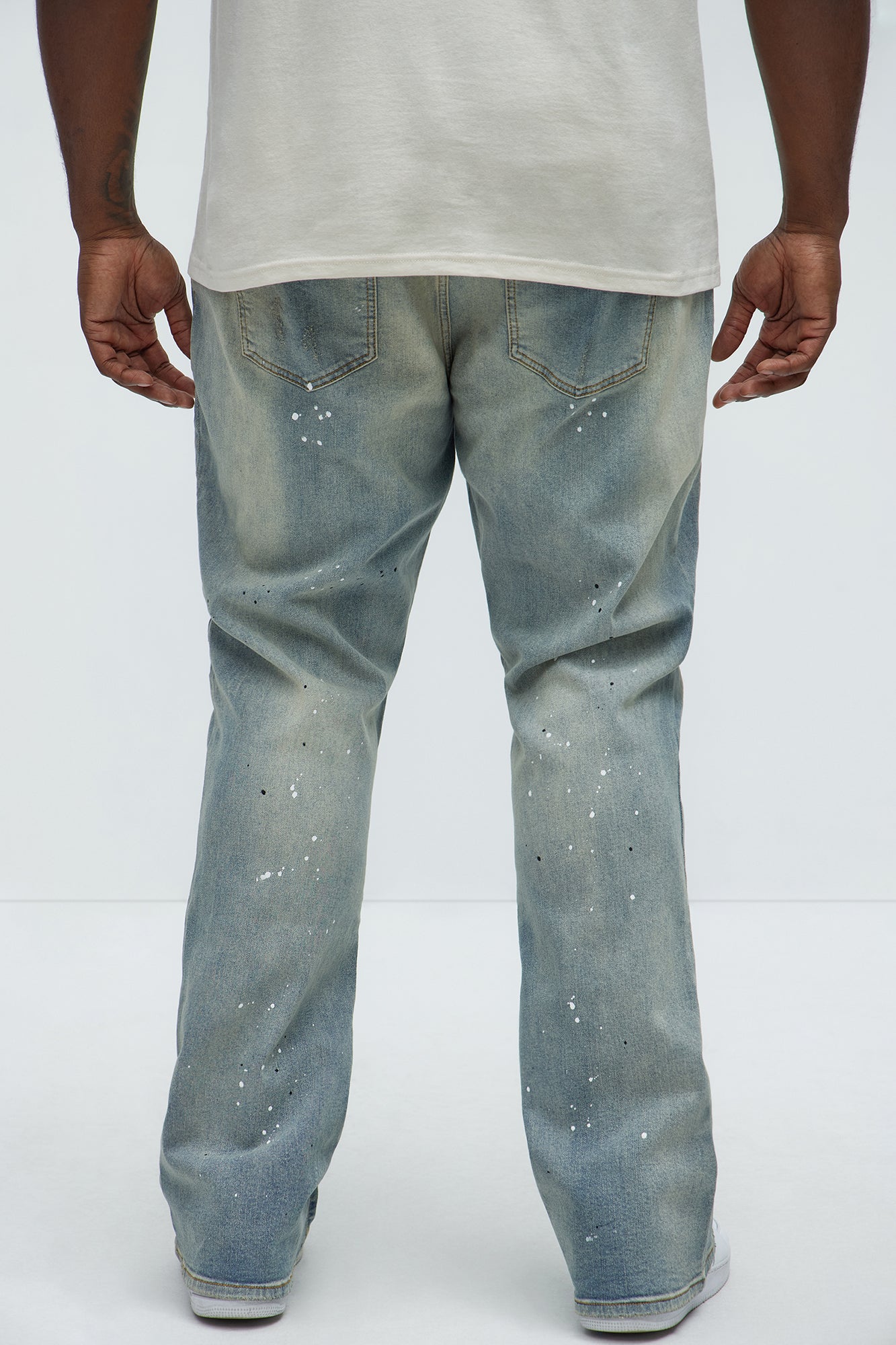 Ripped And Bleach Splatter Stacked Slim Flare Jeans - Light Blue Wash